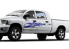 blue chrome mud splash vinyl decal on driver side of white pickup