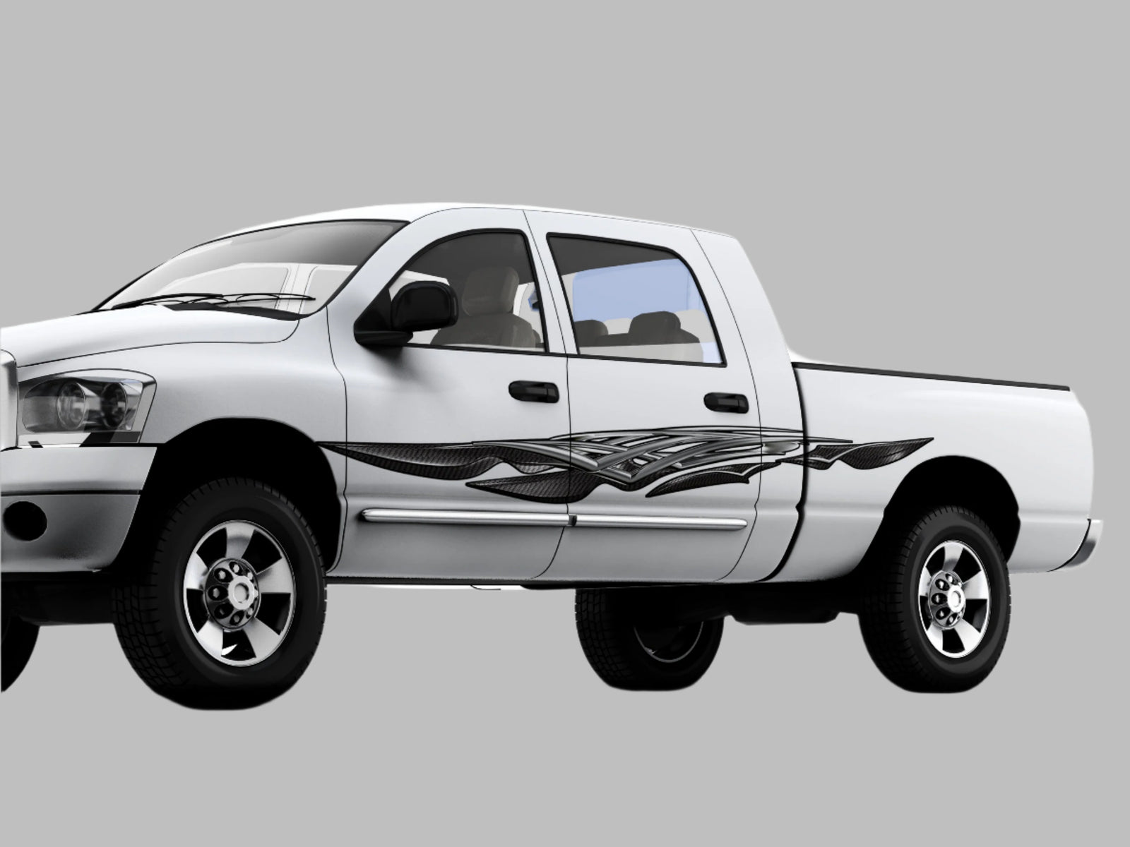 carbon fiber chrome spear graphic decal on the side of white truck