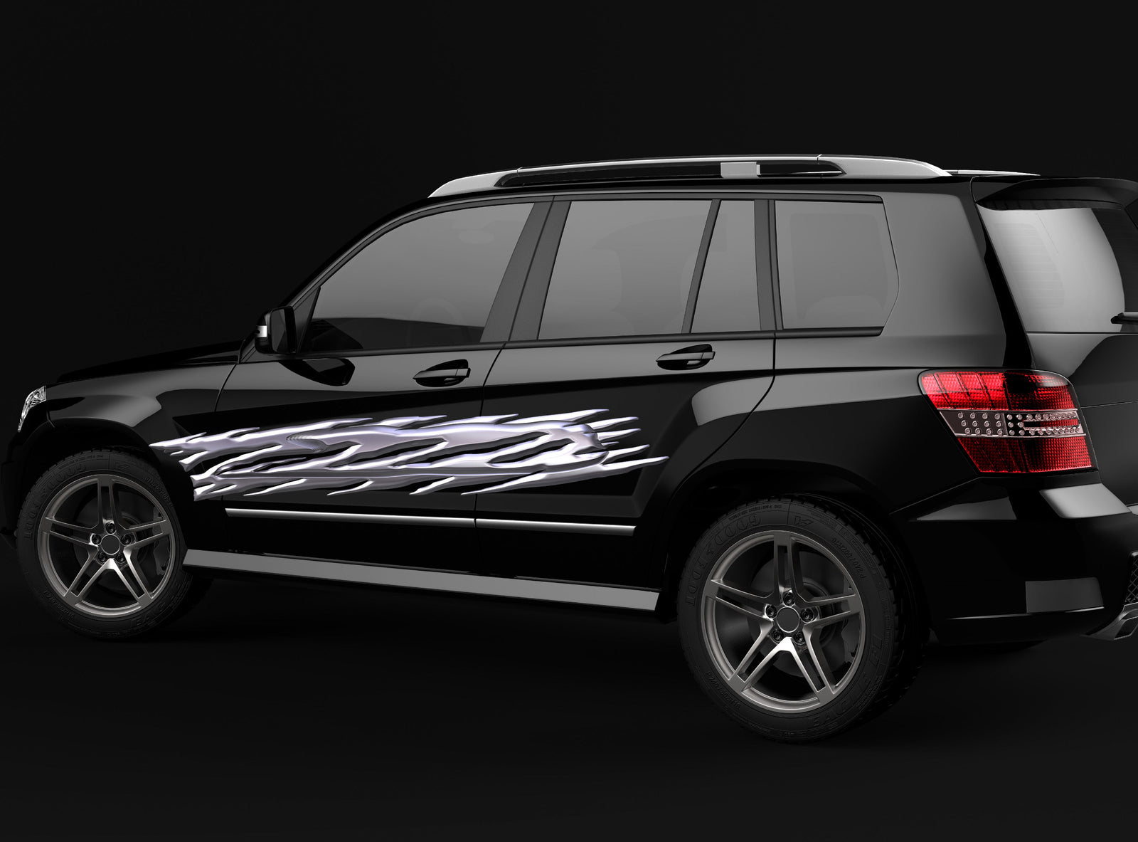 chrome flames vinyl graphics on the side of black suv 