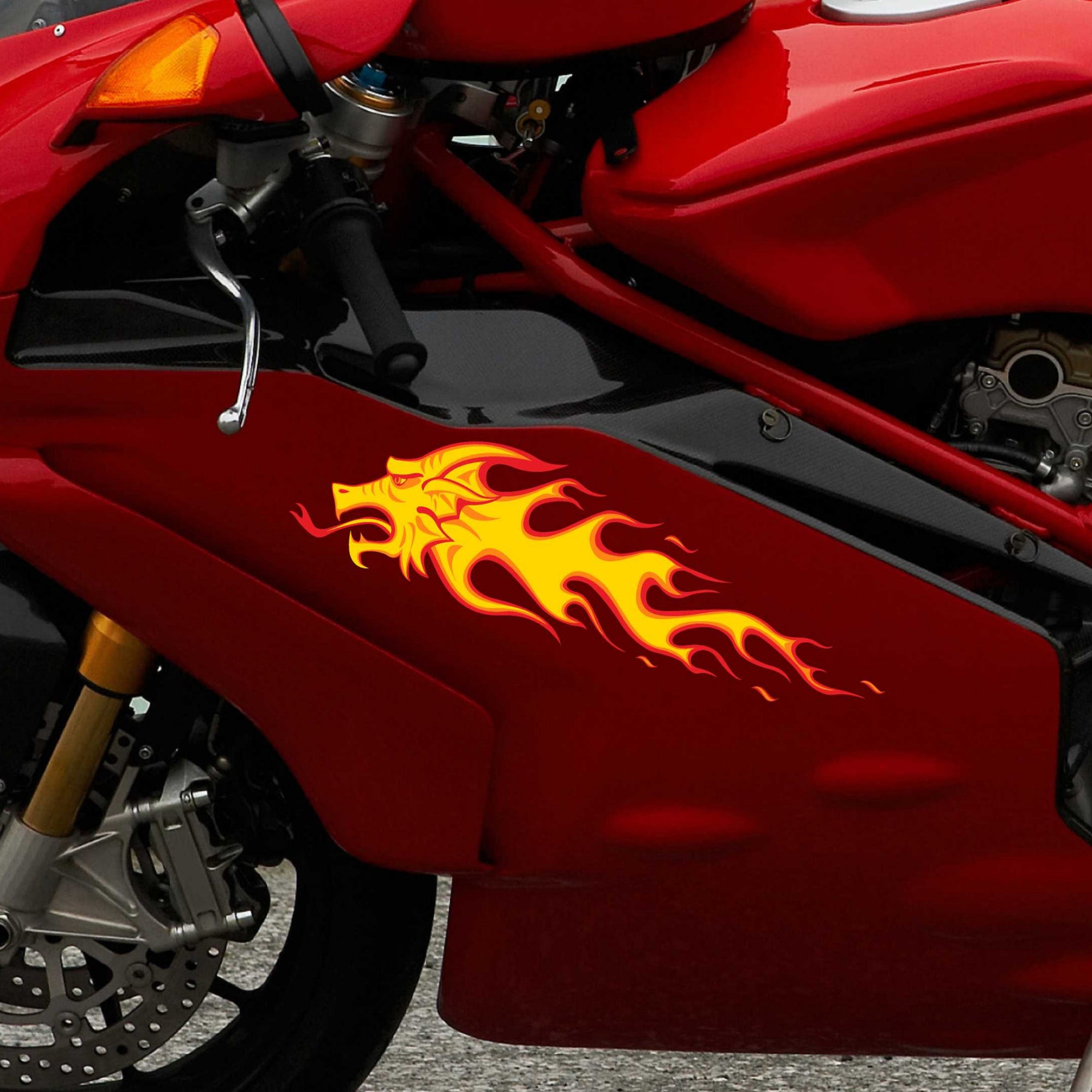 dragon flames decal on the gas tank of black motocycle