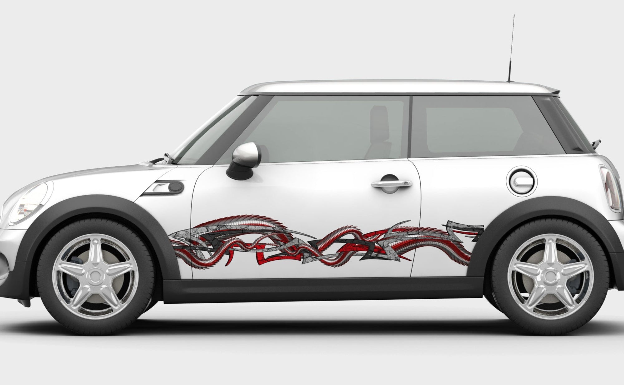 dragon tribal decal on the side  of mini cooper car