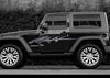 black jeep wrangler with metal style spear arc vinyl graphics on driver side