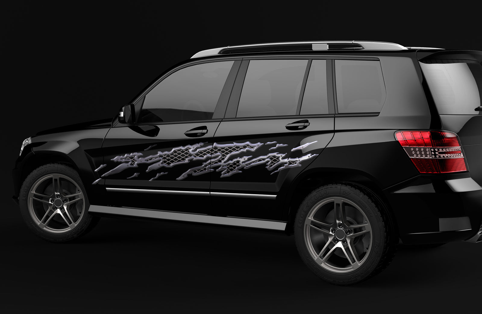 metal mud splash vinyl graphics on the side of black suv