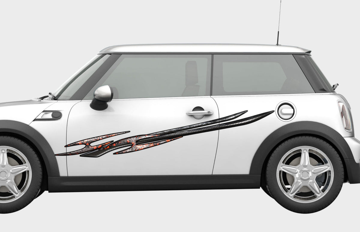 mini cooper with tribal spike vinyl graphics on driver side
