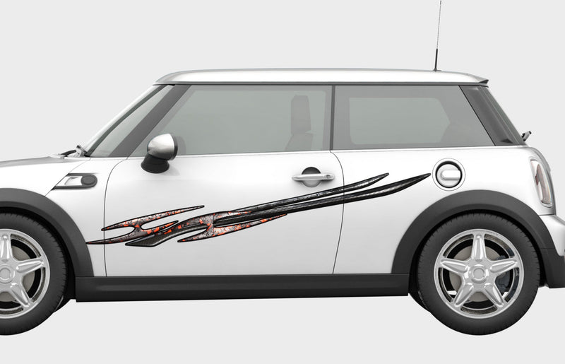 mini cooper with tribal spike vinyl graphics on driver side