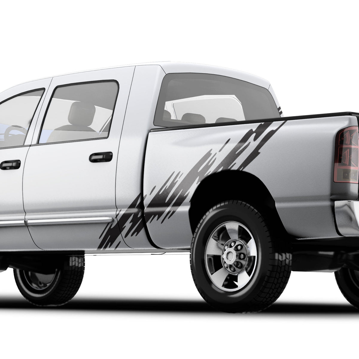 mud splash black decal on the bed of white pickup truck