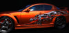 orange coupe sports car with tribal dragons on its driver side
