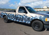 pickup truck with chrome skulls vinyl half wrap on passenger side