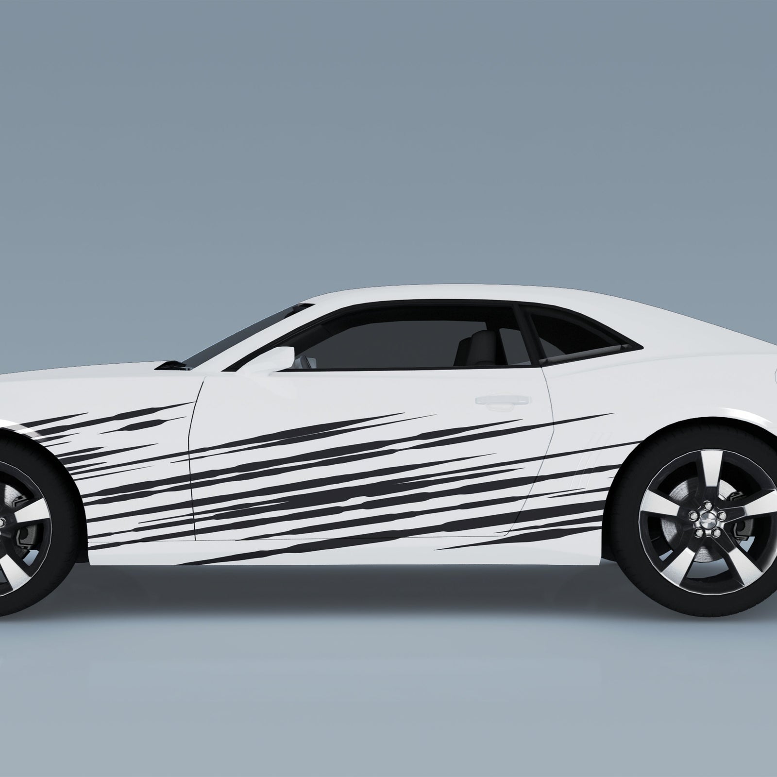 White camaro sports car with black vinyl  racing stripes on the sides