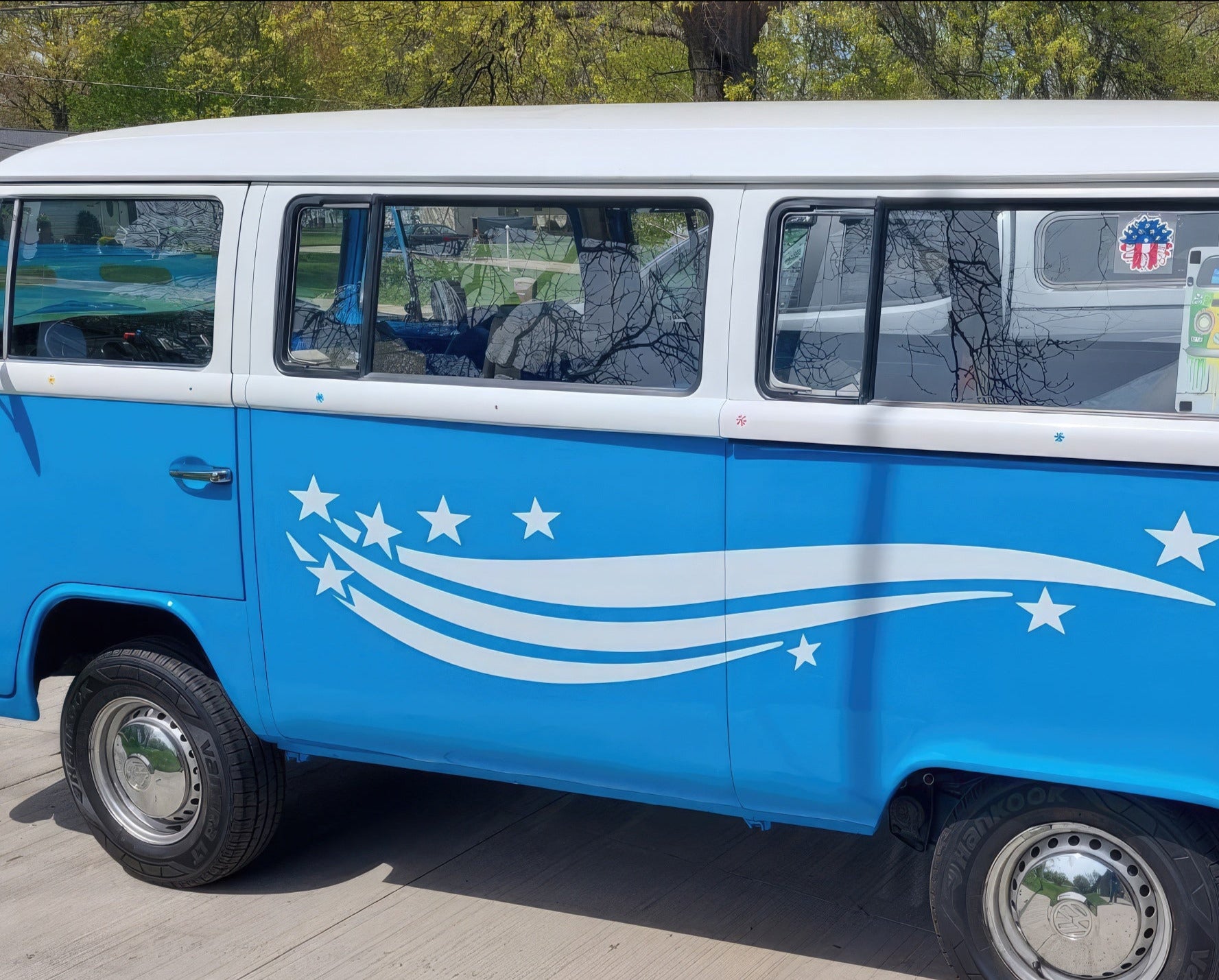 stars & stripes vinyl graphics on the side of volkswagon bus