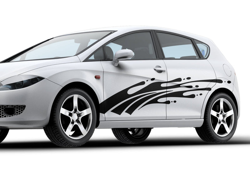 white Hatchback with black mud splash vinyl graphics on driver side