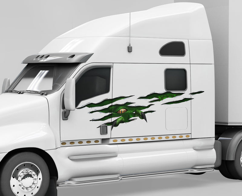 white Semi truck with Monster rip tear decal on driver side