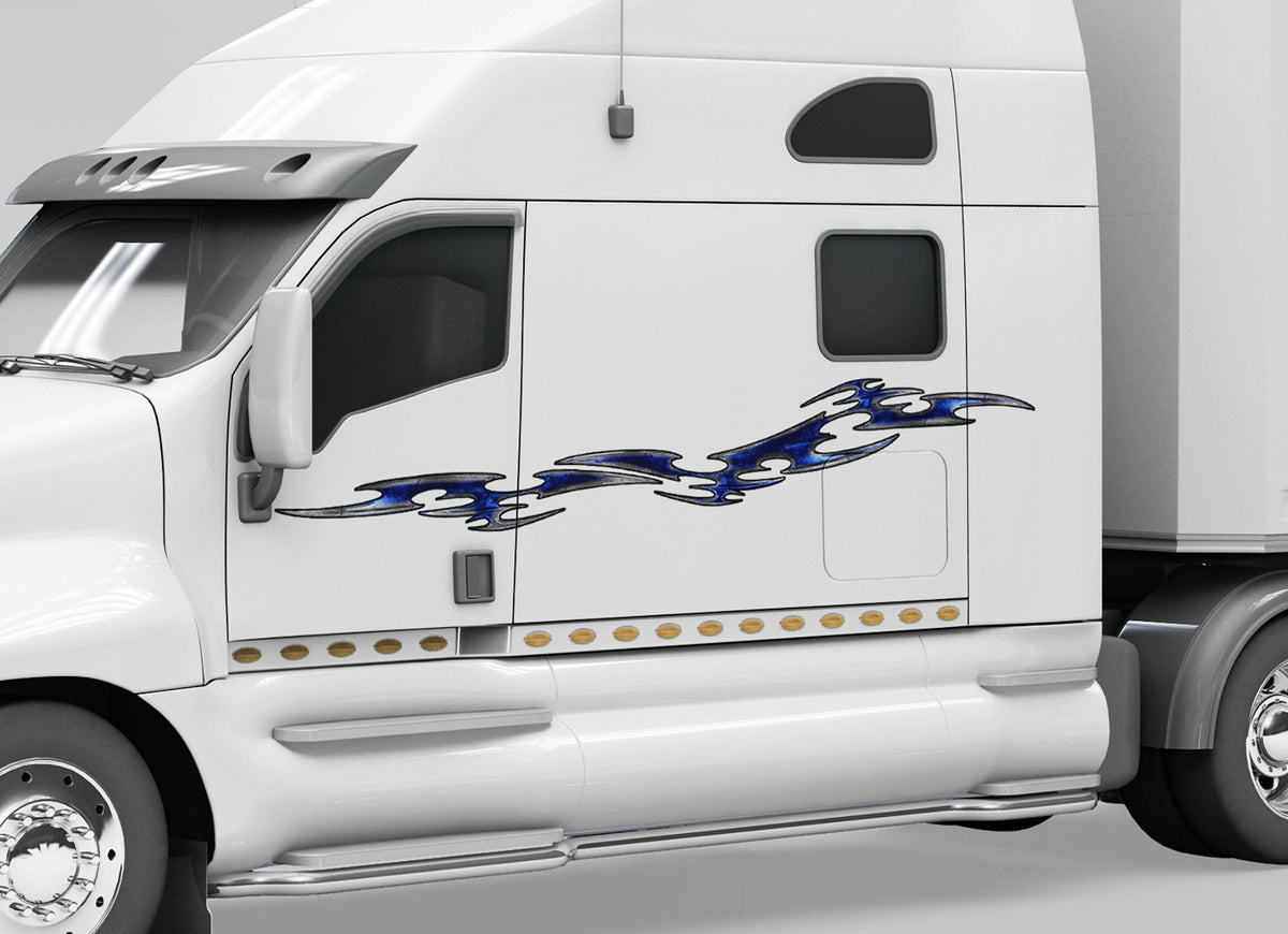 white big rig semi with blue tribal decal stripe across the cab driver side