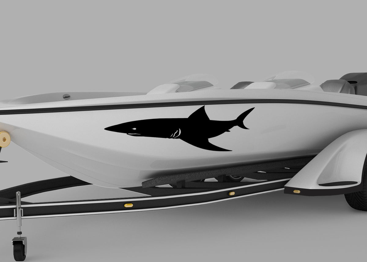 white boat with Shark black Silhouette vinyl decal on port side