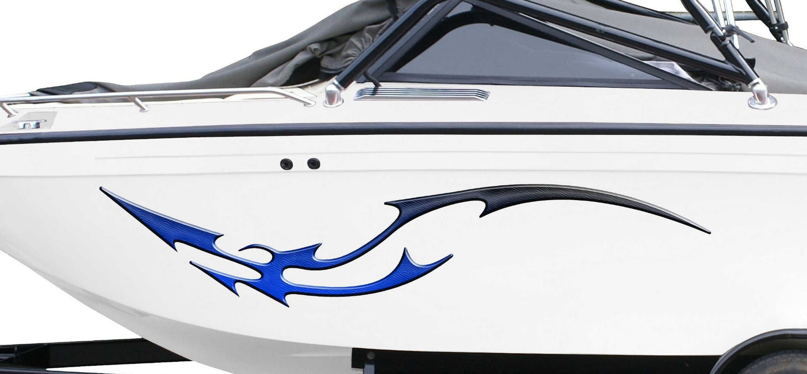 white boat with green dragon tail vinyl graphics on hull port side