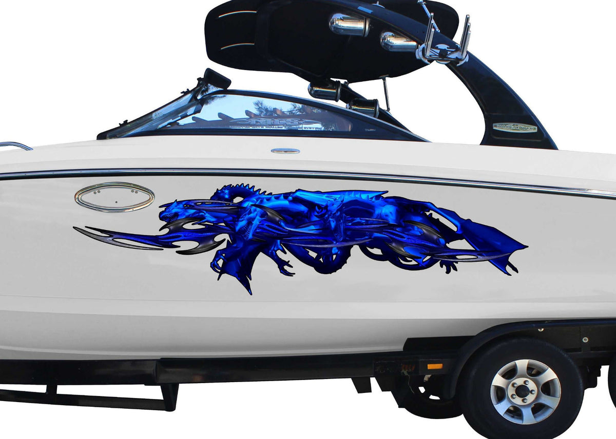 white boat with blue tribal dragon vinyl graphics on port side