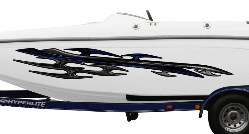 white boat with bluish tribal metal style vinyl graphics on its side