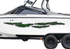 white boat with neon green skulls tears vinyl graphics on port side of boat that on trailer