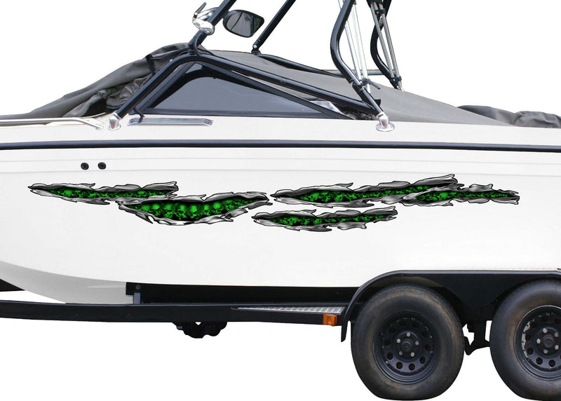 white boat with neon green skulls tears vinyl graphics on port side of boat that on trailer
