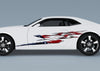white camaro sports car with american flag spearfire flames vinyl graphics on driver side