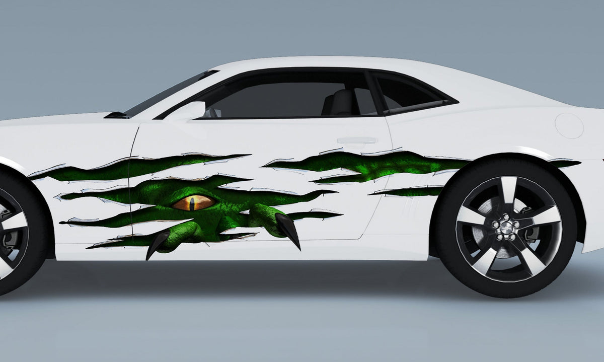 white camaro sports car with green monster metal tear decal on driver side