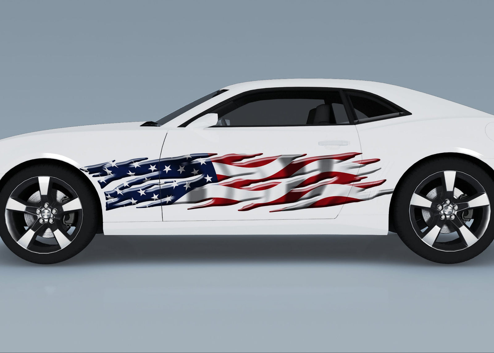 white camaro with american flag flames vinyl decal on driver side