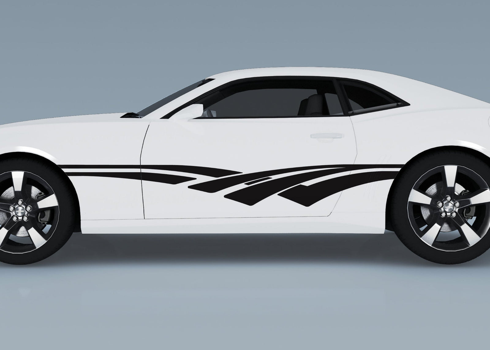 white camaro with black vinyl decal stripes on driver side