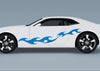 white camaro with blue tribal flames vinyl graphics on driver side