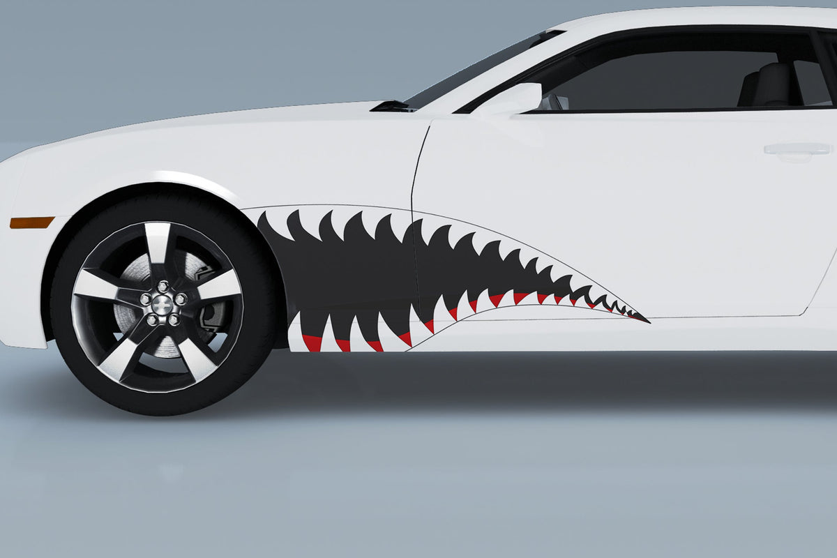 white camaro with fighter jet style teeth vinyl graphics on driver side
