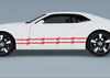 white camaro with red barbwire vinyl graphic stripes on driver side