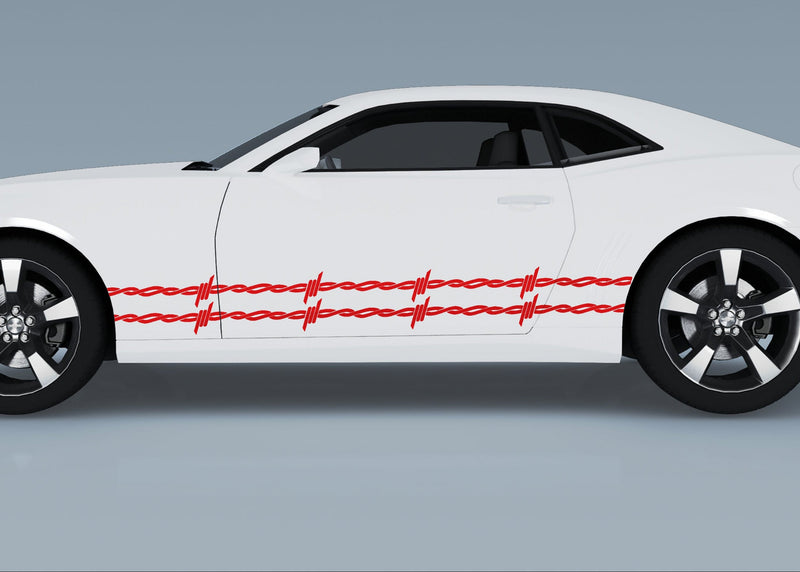 white camaro with red barbwire vinyl graphic stripes on driver side