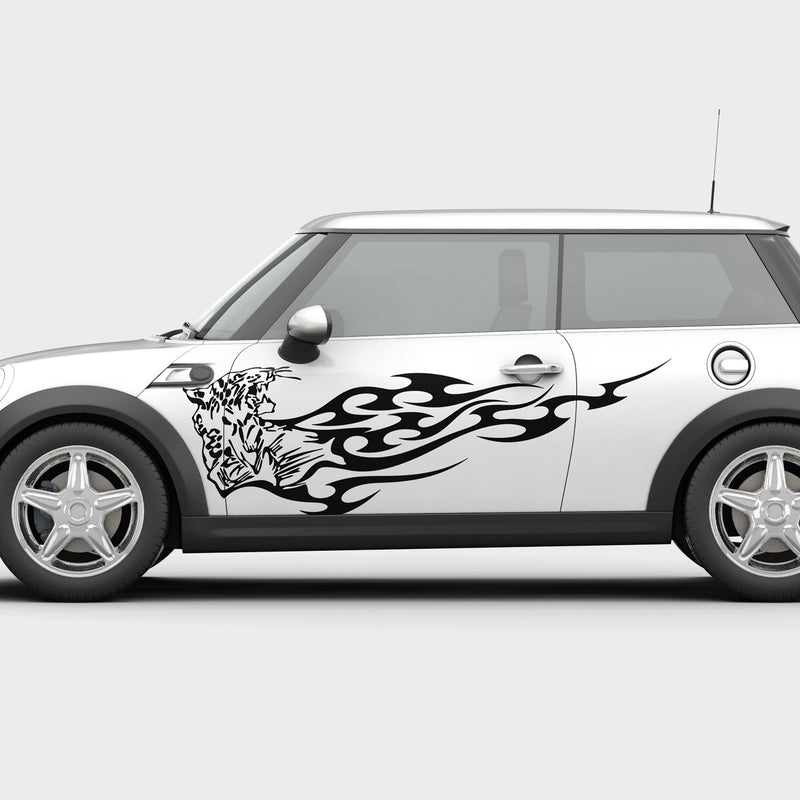 white mini cooper car with leopard flames vinyl graphics on driver side