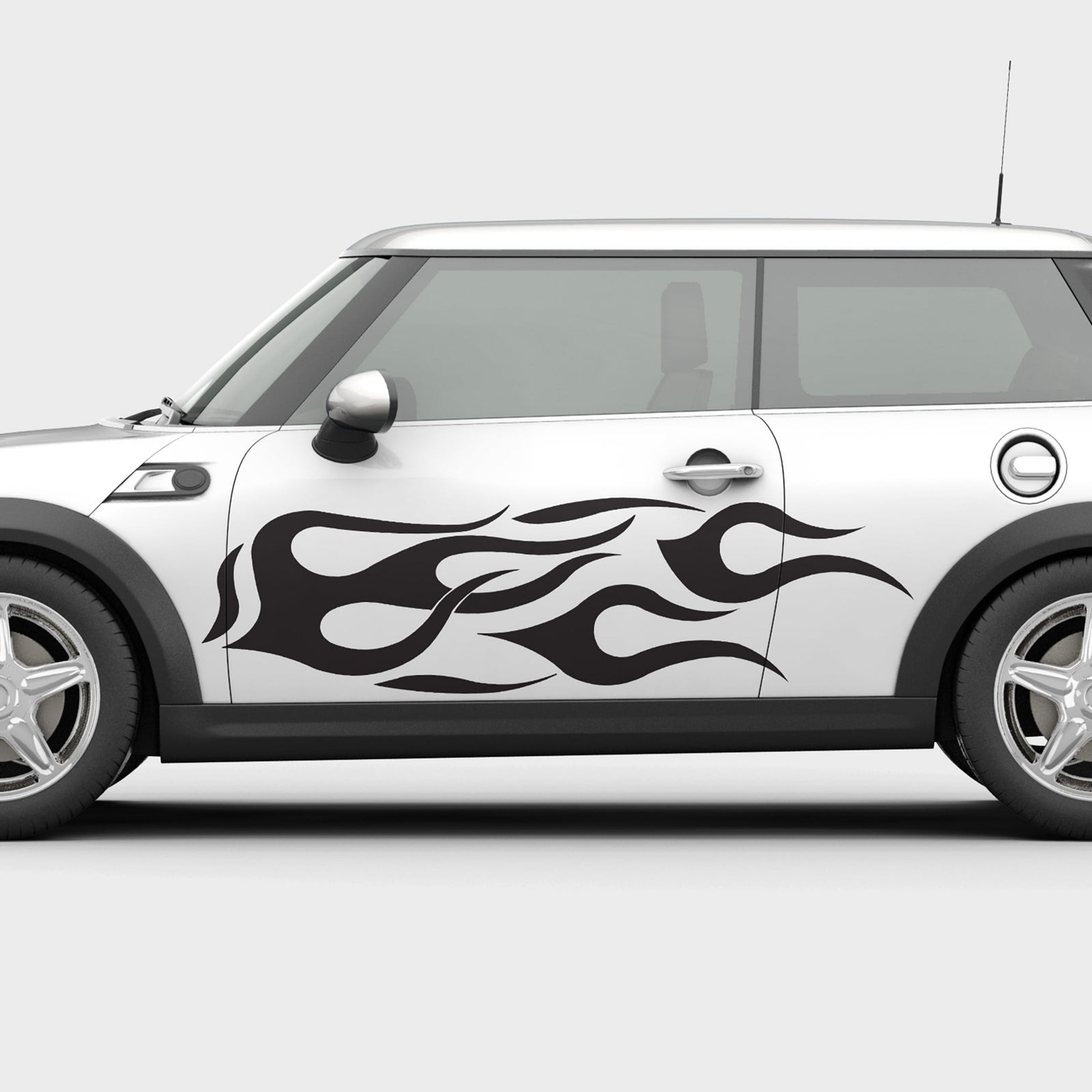 yellow camaro sports car with black vinyl flames decals on the side