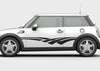 white mini cooper with sweep black vinyl decal stripes on driver side