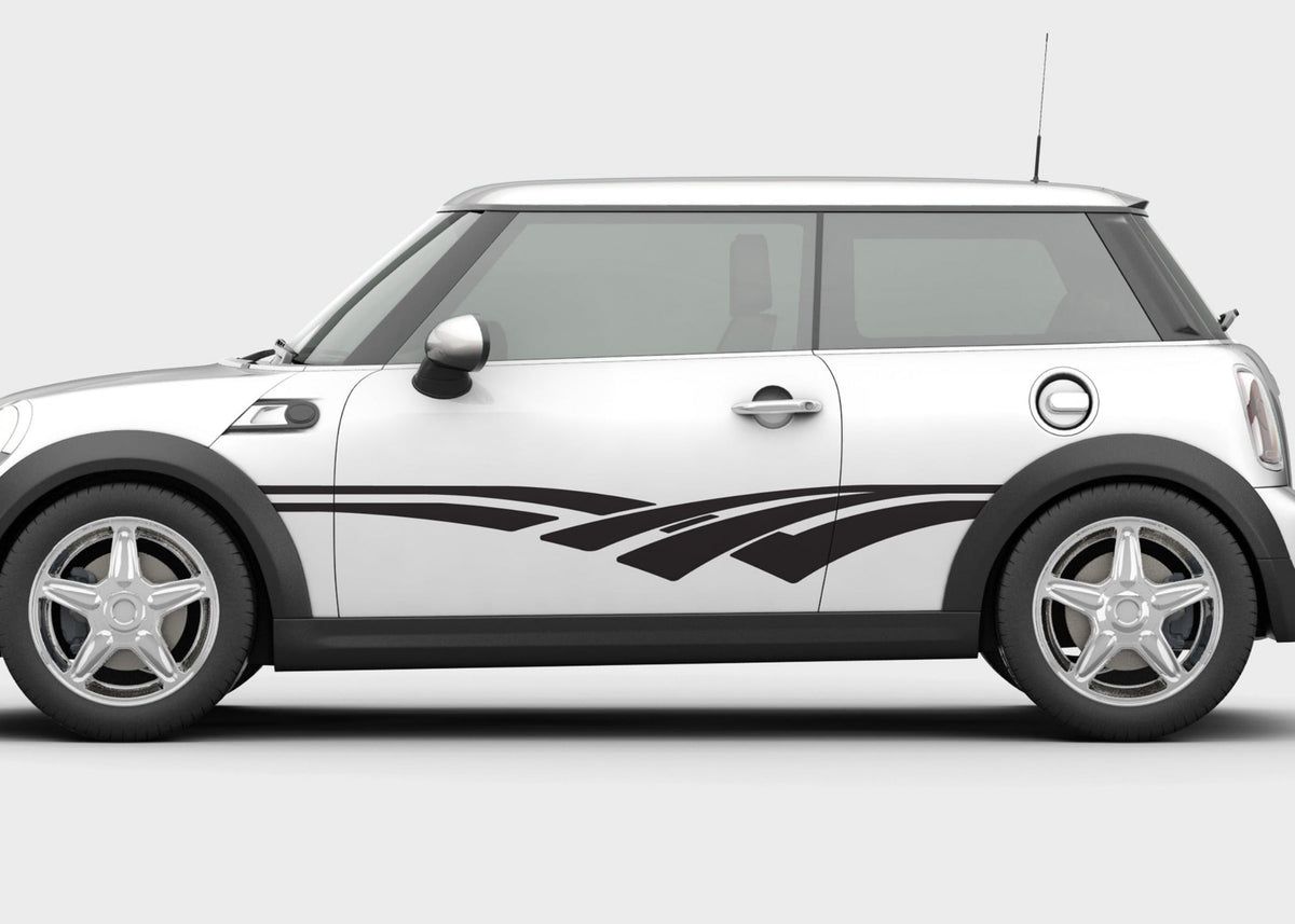 white mini cooper with sweep black vinyl decal stripes on driver side