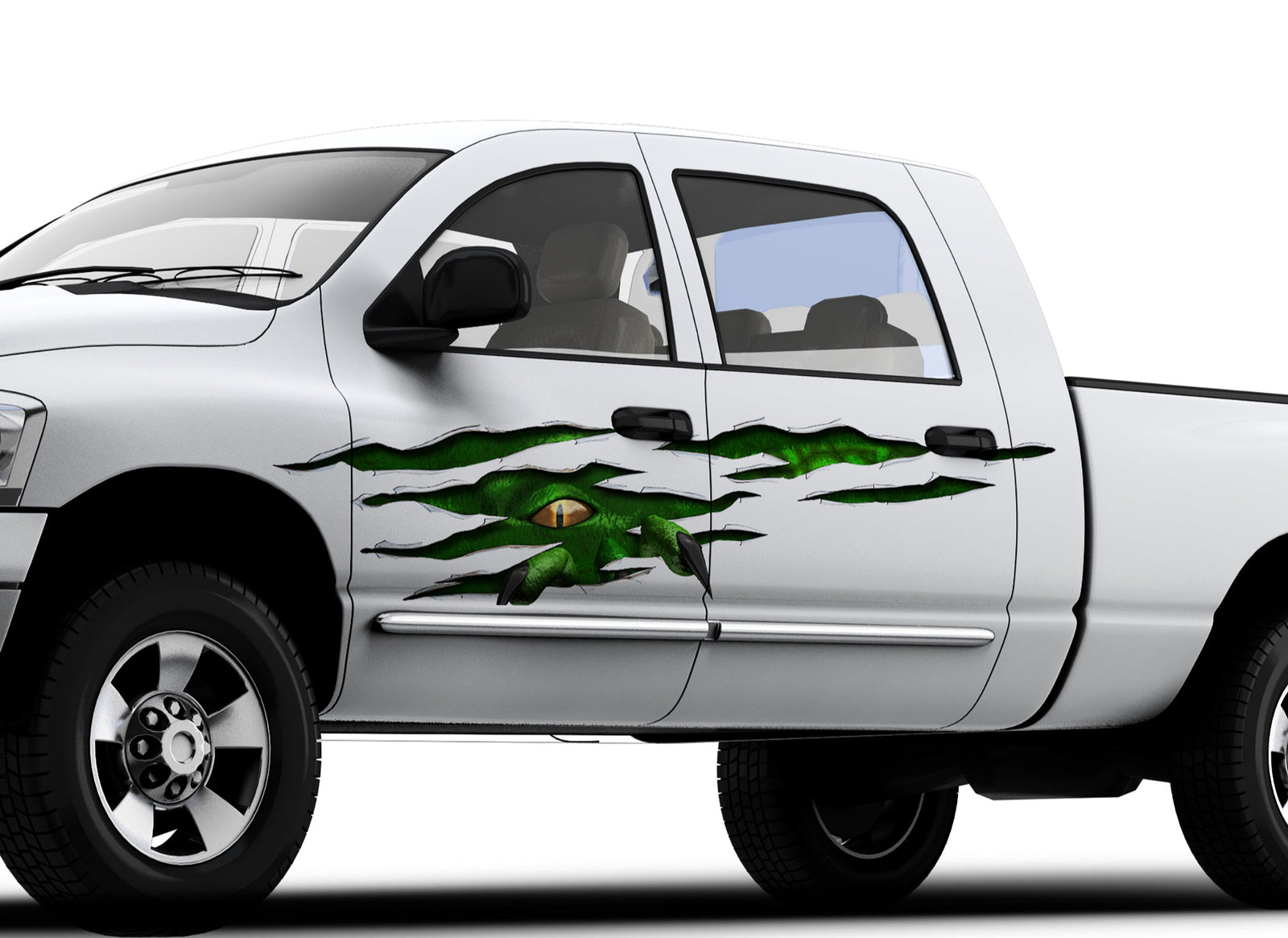 white pickup with Green Monster Rip tear vinyl graphics on driver side