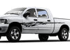 white pickup with black mud splash decal stripe on driver side