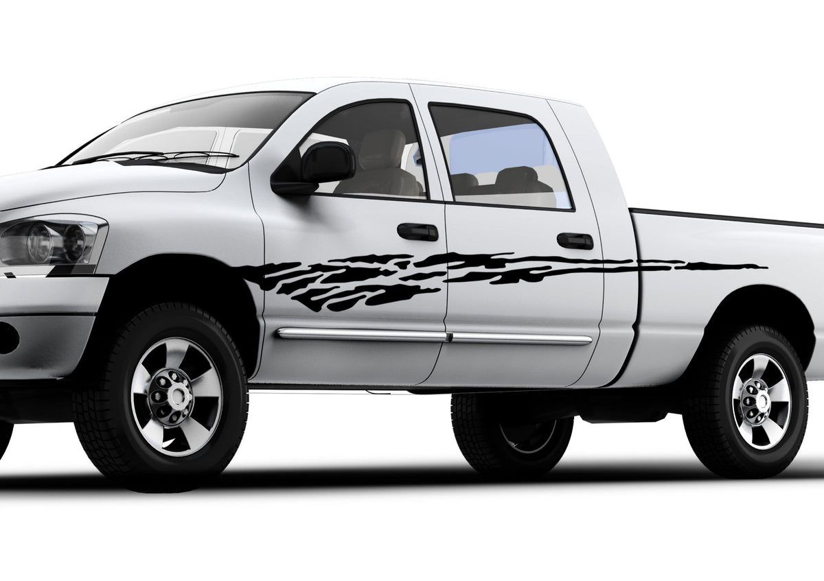 white pickup with black mud splash decal stripe on driver side