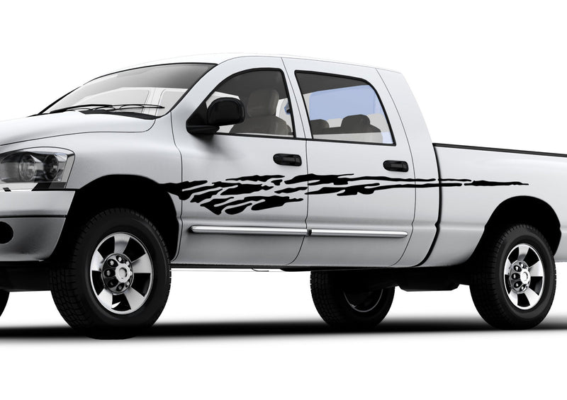white pickup with black mud splash decal stripe on driver side