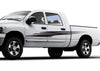 white pickup with black vinyl falcon wing decal or driver side