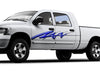 white pickup with blue spear arc vinyl decal on driver side