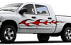 white pickup with red flame skulls decals on driver side