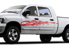 white pickup with red mud splash vinyl cut graphics on driver side