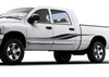 white pickup with vinyl cut black stripe from wheel to wheel on driver side