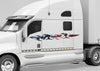 white semi trailer with American flag tribal flames vinyl decals on driver cab side