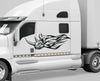 white semi truck with black rhino flames vinyl cut decals on cab driver side