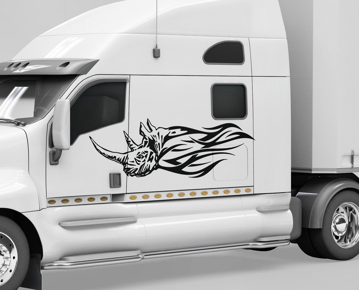 white semi truck with black rhino flames vinyl cut decals on cab driver side