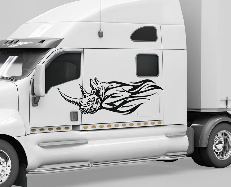 white semi truck with black rhino flames vinyl cut decals on cab driver side
