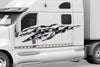 white semi with large checkers vinyl decal on its cab side