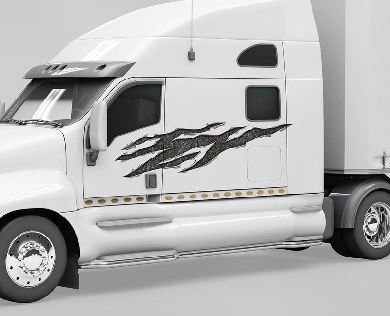 white semi with woodland camo rip vinyl graphics on its driver side